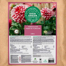 Gaia Green flowering and fruiting crops benefit from organic feed in garden.