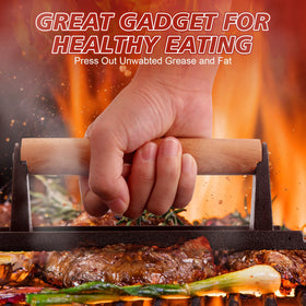 Gandeer pan-cooking iron press used on pan to flatten meat and reduce cook time.