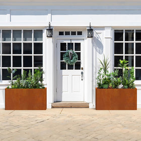 Ganeekiron Corten planter on patio illustrating large space for plants.