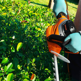 GARCARE hedge trimmer in use, delivering neat results with lightweight handling.