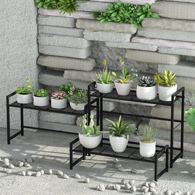 Garden 4 you 3-tier plant stand in garden for versatile outdoor display.