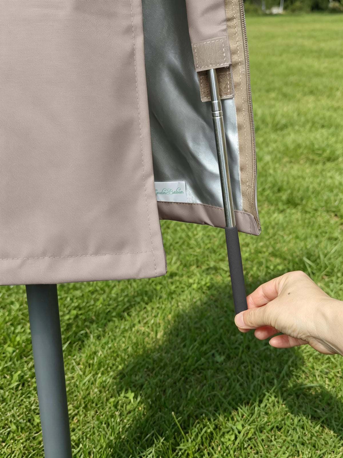 Garden Balsam wind-resistant cover with drawstring bottom prevents wind-blown movement