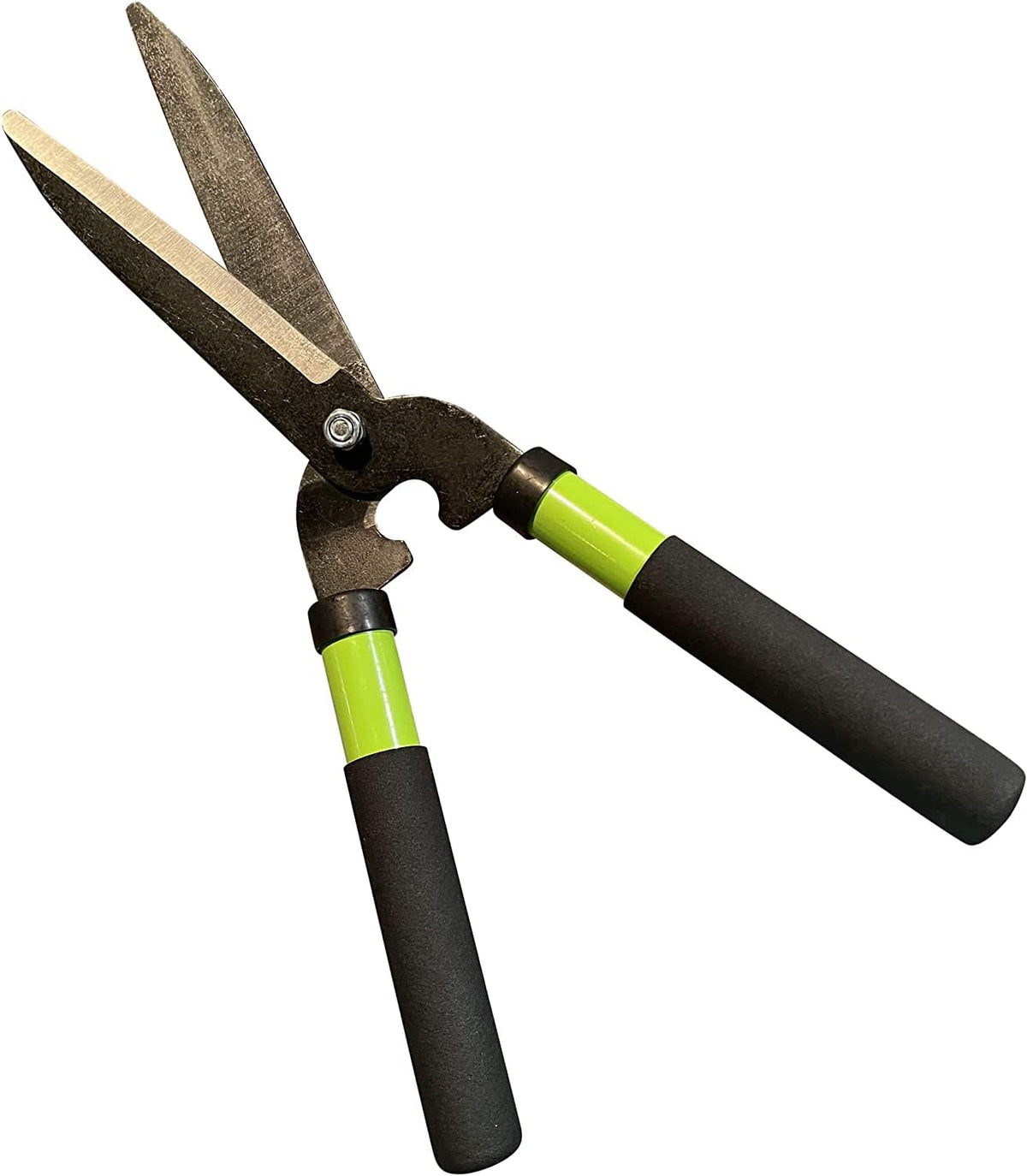 Garden Guru hedge shears shaping shrubs with even edges.