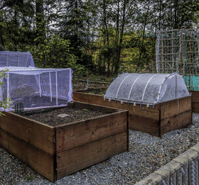 Garden Tailor easy-installation netting fits around hoops for quick protection.