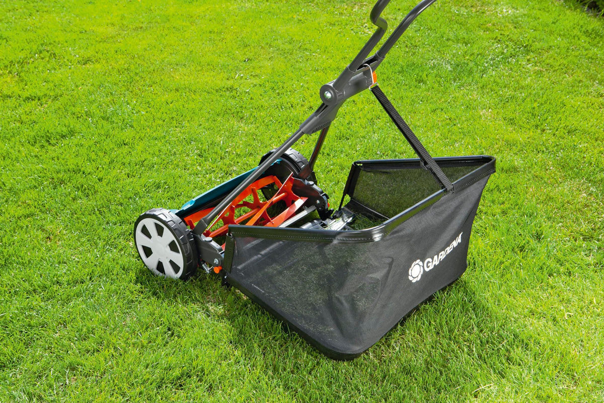 Gardena Classic 16-inch mower on lawn during daytime mowing.