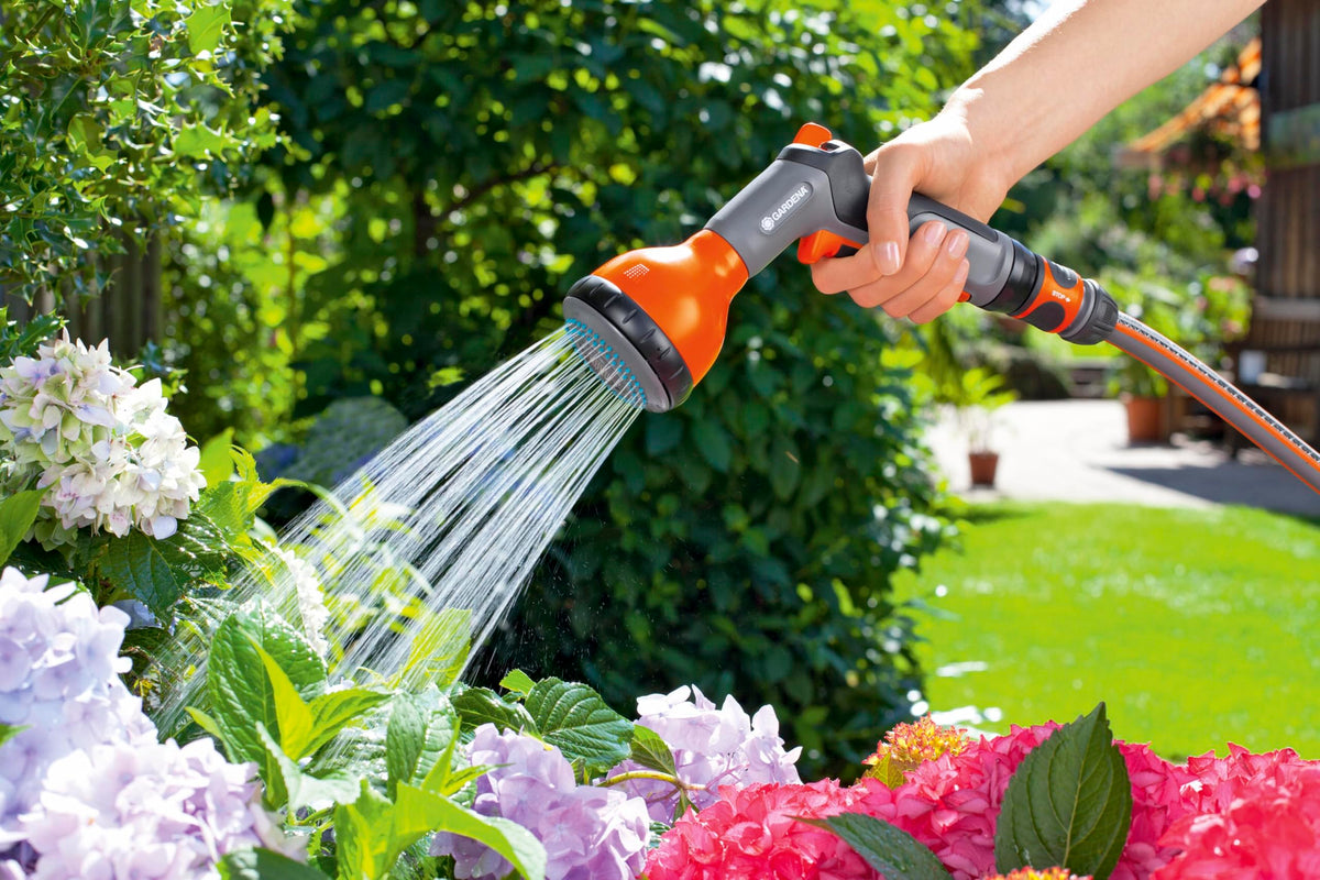 Gardena Classic Multi Sprayer watering beds with even mist for healthy plant beds.