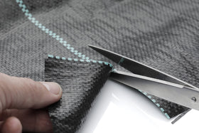 GardenMate path-construction fabric supports stable walkways with weed suppression.
