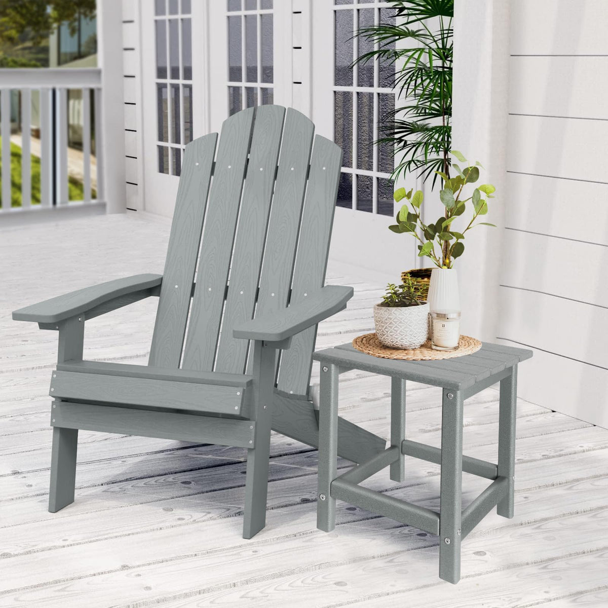 GardenStar Adirondack side table assembled beside a chair, highlighting compact footprint