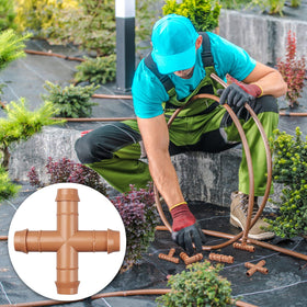 Gardrip cross tee barbed ends grip tubing for leak-free connections.
