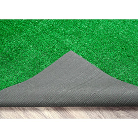 Garland Rug artificial grass indoors used as a safe play area for children.