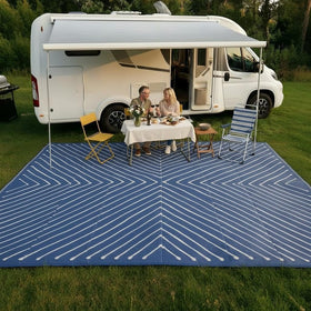 Garvee rug beside hose for quick cleaning after spills.