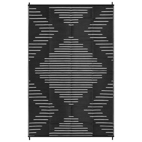 Garvee black and white outdoor rug fits entryways and outdoor spaces.