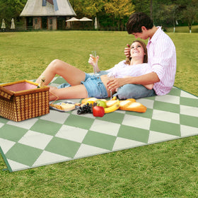 Garvee rug comes with carry bag and ground stakes for secure setup.