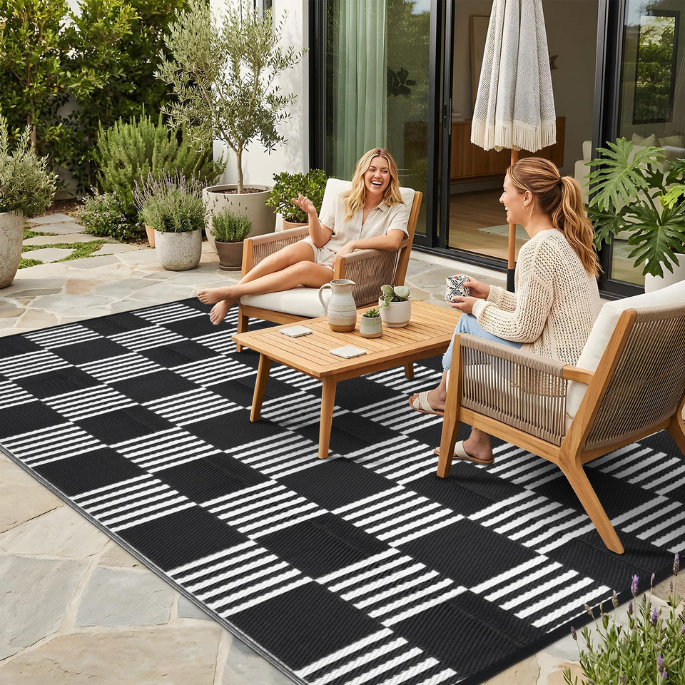 Garvee checkered 5x8 rug folded for compact storage and travel convenience.