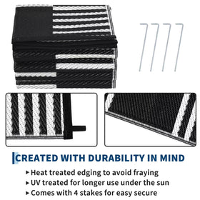 Garvee checkered rug on RV deck offering versatile outdoor use.