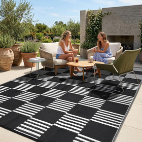 Garvee checkered rug 8x10 on patio, durable waterproof surface ideal for outdoor gatherings