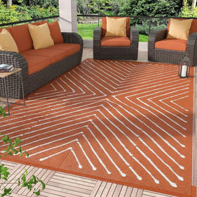 Garvee orange-white reversible rug with patio pattern for versatile outdoor styling