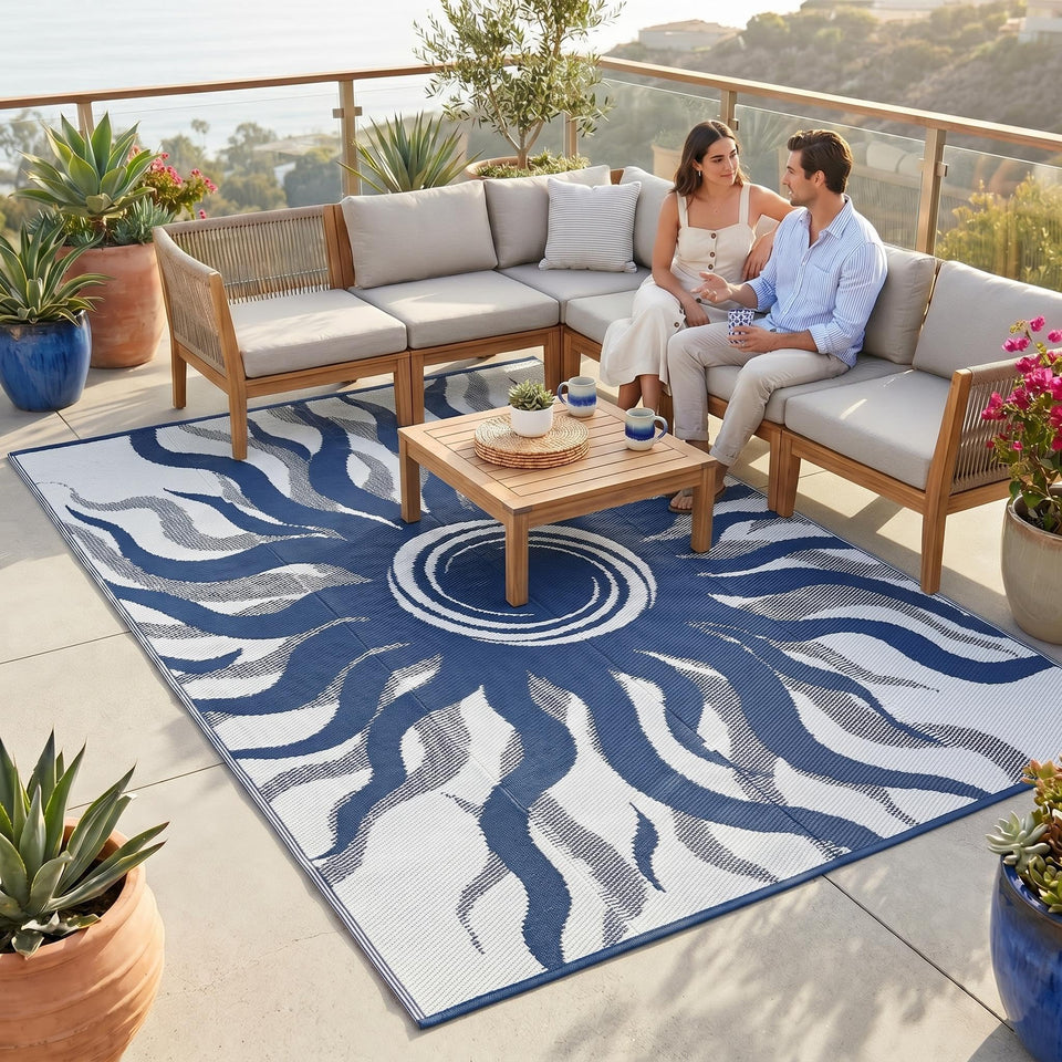 Garvee Outdoor Rug 8x10 with boho sun pattern on a deck, easy to clean.