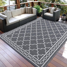 Garvee outdoor rug 8x10 in RV camping setup highlighting portability