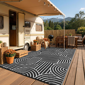 Garvee rainbow rug folds compactly in packaging for portable storage.