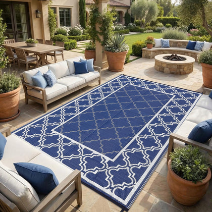 Garvee reversible outdoor rug in blue with interlacing pattern for patios