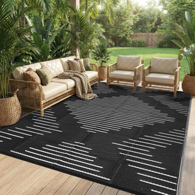 Garvee reversible outdoor rug offers two looks in one mat for versatile outdoor use.