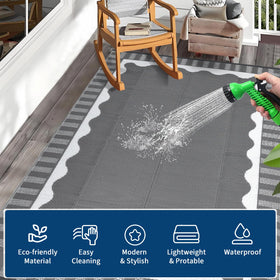 Garvee reversible outdoor mat offers two looks for picnics and backyard lounging.