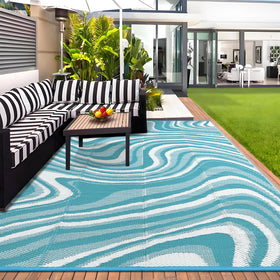 Garvee light-blue outdoor rug showing versatile patio layout.