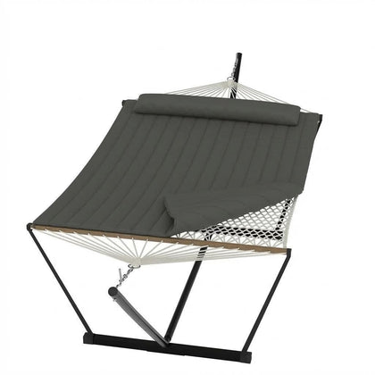 Garvee two-person portable hammock with stand in patio setting for versatile lounging