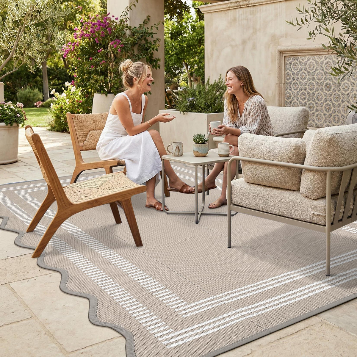 Garvee waterproof outdoor rug with scalloped edge on a patio, durable and easy to clean