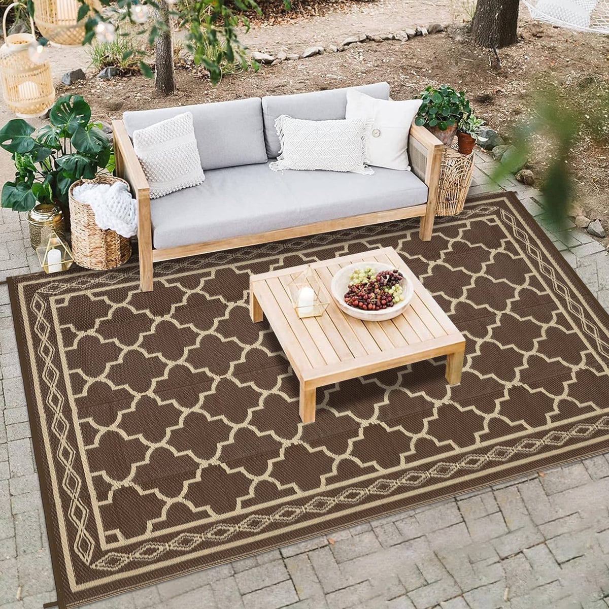 GarveeLife waterproof rug at the beach or campsite keeps sand away.