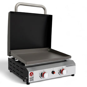 Gas One flat top grill with lid on a tabletop ready for versatile outdoor cooking