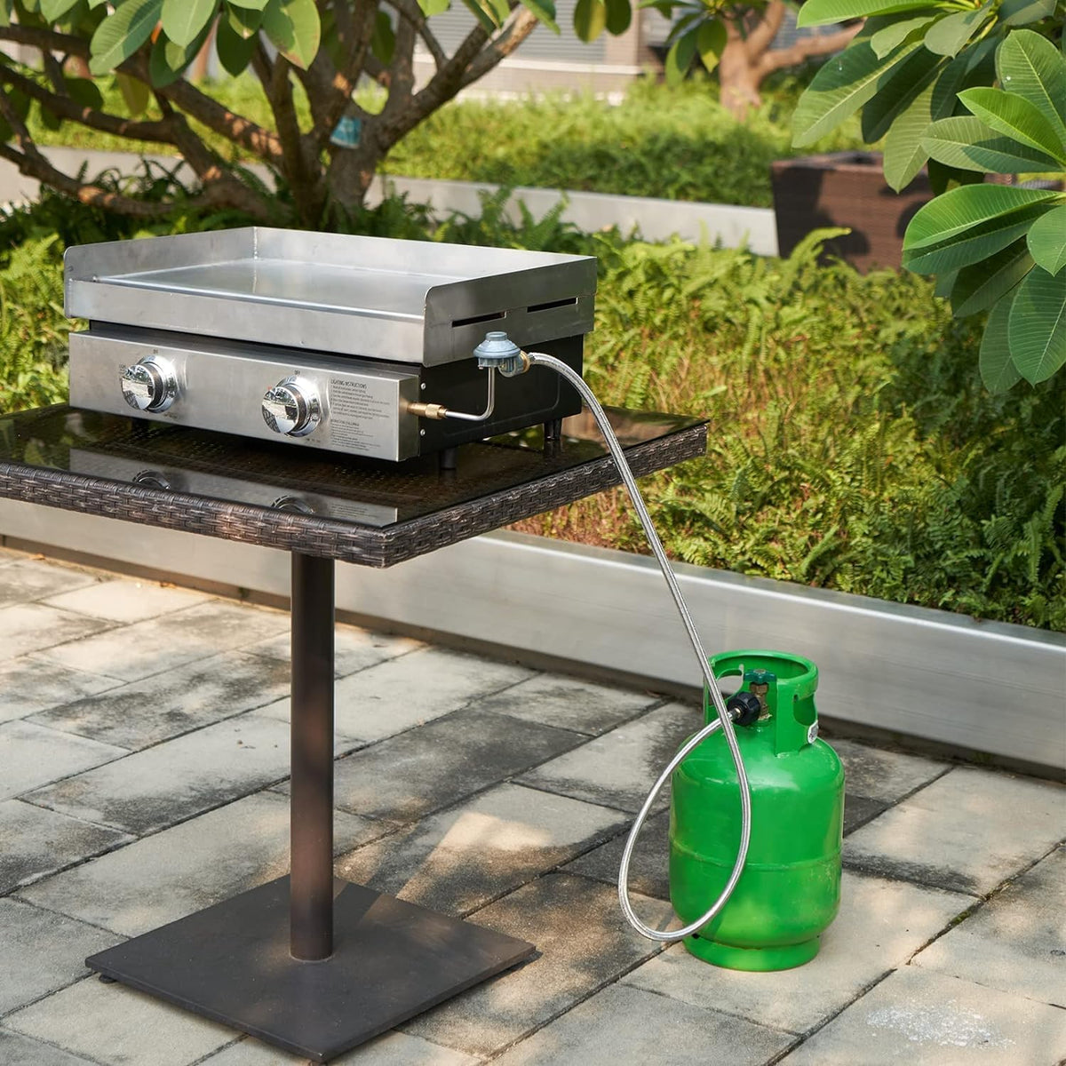 GasPro hose attached to Blackstone griddle for steady propane flow
