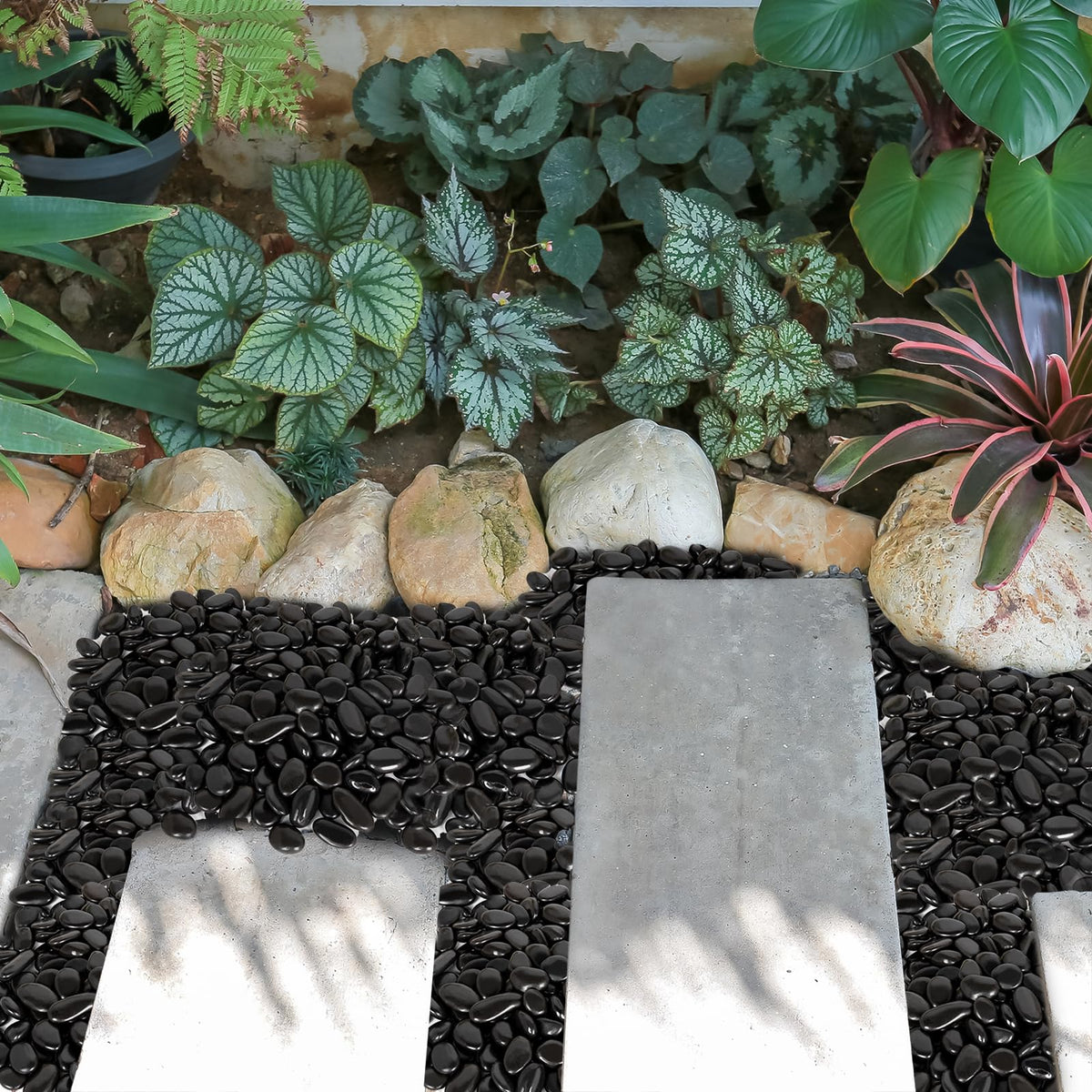 GASPRO outdoor landscaping pebbles in deep black finish