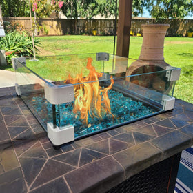 GasPRO square wind shield in use, enhancing outdoor ambience safely.
