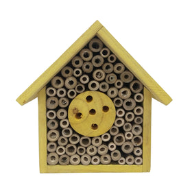 Gate 35 eco-friendly bee house mounted in garden space near plants