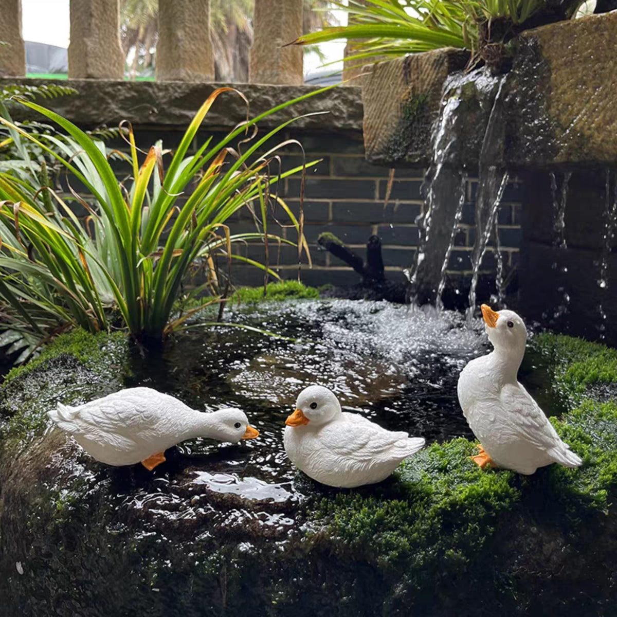 GBHKPLFO duck sculpture among rocks brightens garden borders and walkways