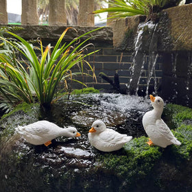 GBHKPLFO duck sculpture among rocks brightens garden borders and walkways