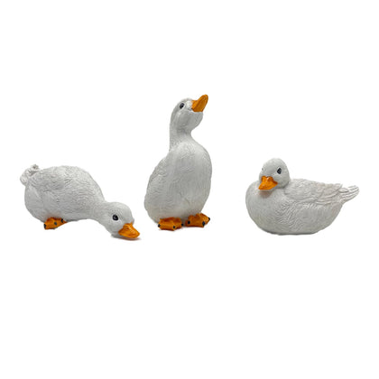 GBHKPLFO duck statue poised over pond adds playful charm to outdoor spaces