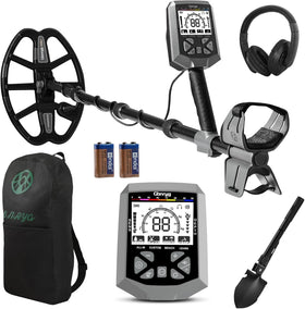 Gbnryg metal detector with 12-inch coil scanning a sunlit beach for coins