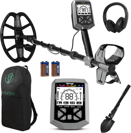 Gbnryg metal detector with 12-inch coil scanning a sunlit beach for coins