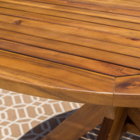 Stamford round table shows the x-shaped base for stable patio meals.