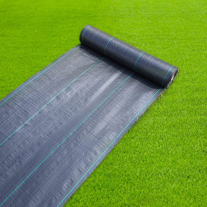 GDNaid weed barrier roll laid out to suppress weeds in a landscape bed