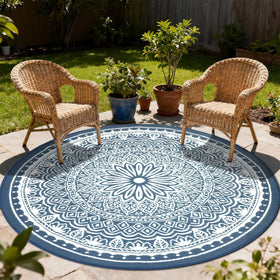 Geanlod 8ft round outdoor rug in blue-white, weather-resistant for patios and decks.