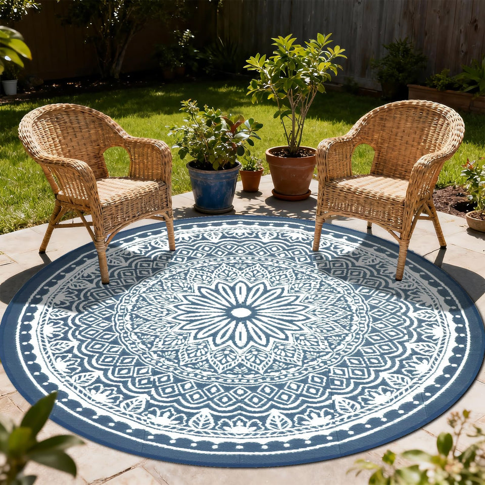 Geanlod 8ft round outdoor rug in blue-white, weather-resistant for patios and decks.