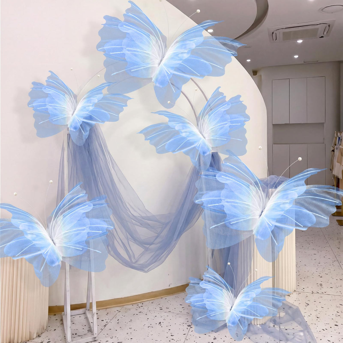 Geelin blue gauze butterfly 19in provides soft, dreamy backdrop decor