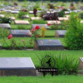 Geelin yard cemetery decoration adds a serene outdoor remembrance.