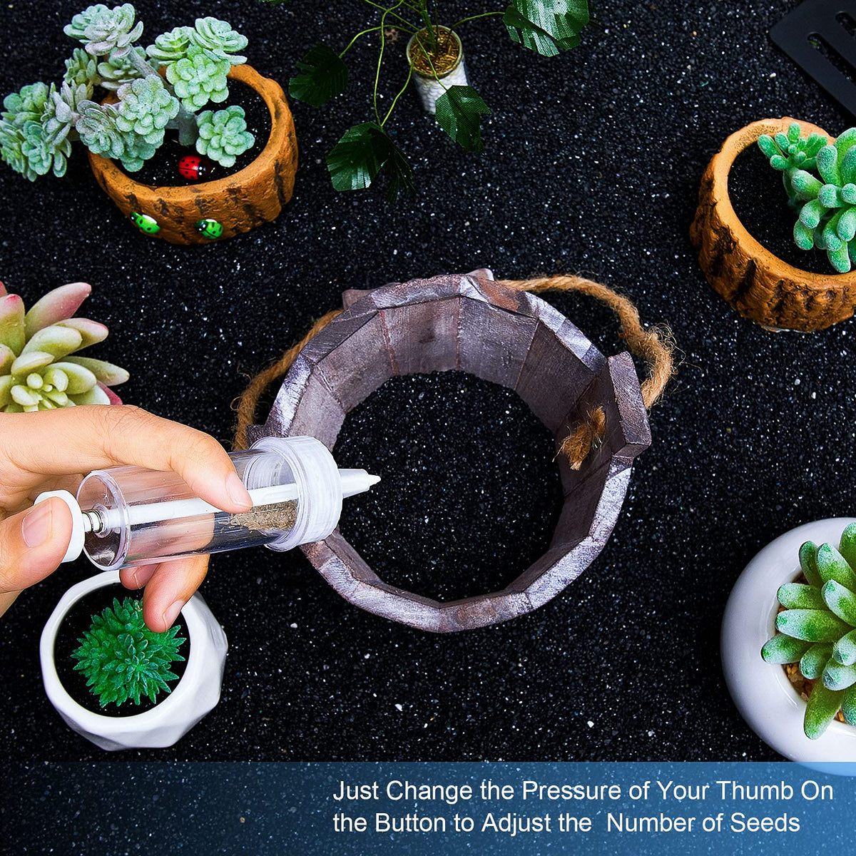 Geiserailie seed dispenser in use planting seeds in a pot.