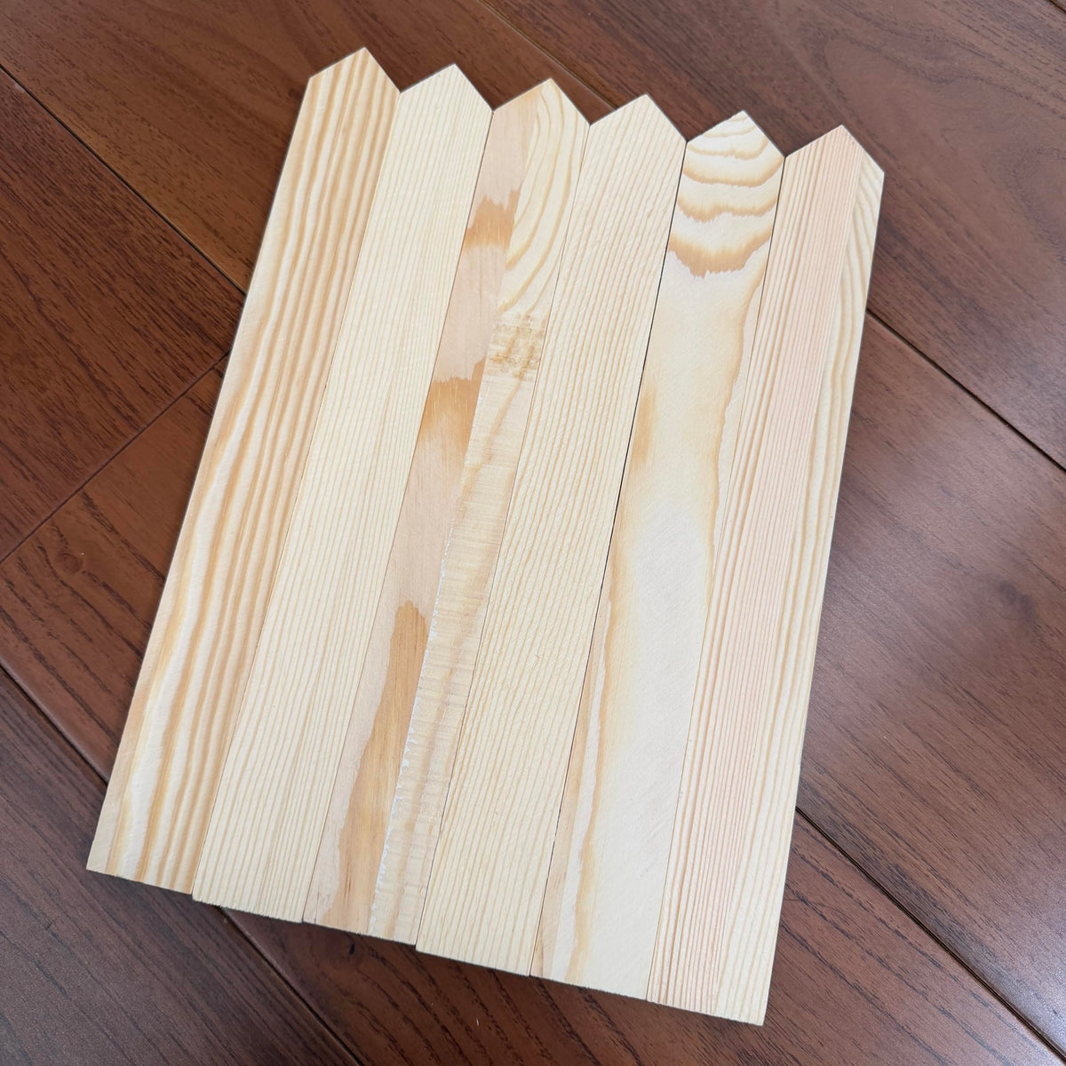 Generic 30-pack wooden stakes used in yard layout projects—planning tool.