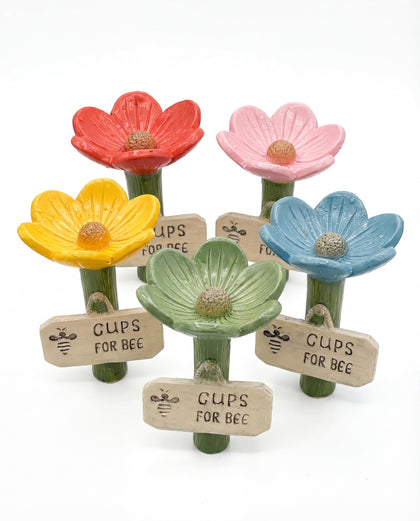 Generic Bee Watering Cups colorful set brightens gardens while aiding pollinators.
